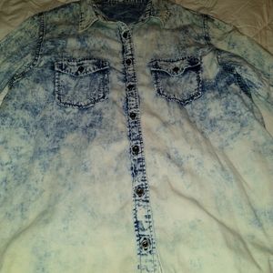 I am selling a button down stone-washed shirt. Size Large- UNISEX